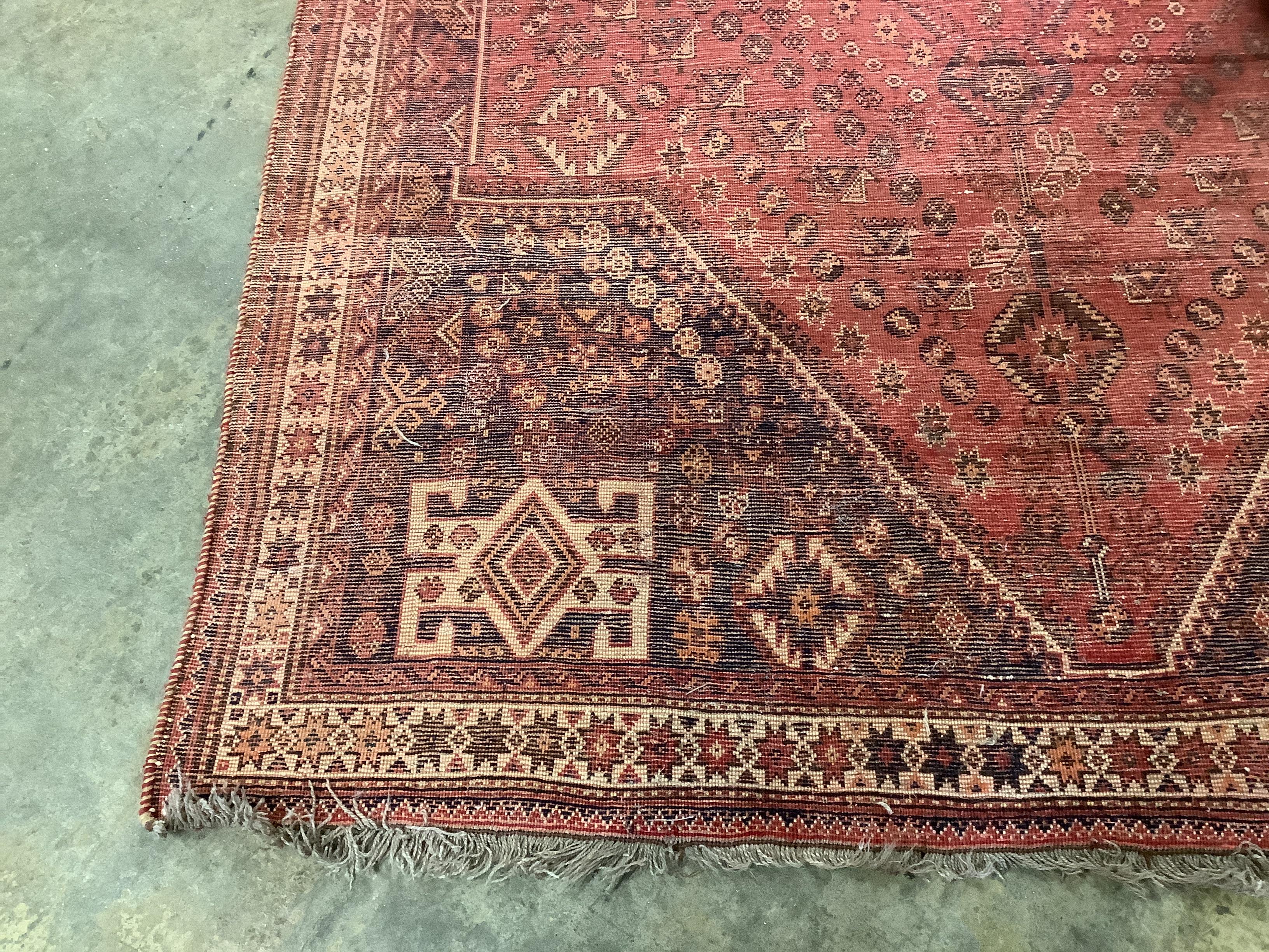 A North West Persian red ground carpet, 254 x 170cm
